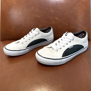 Vans casual skateboarding shoe size white suede and with black leather size 11